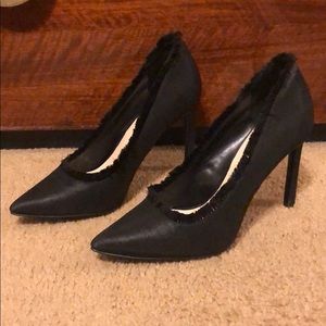 Black heels with fringes